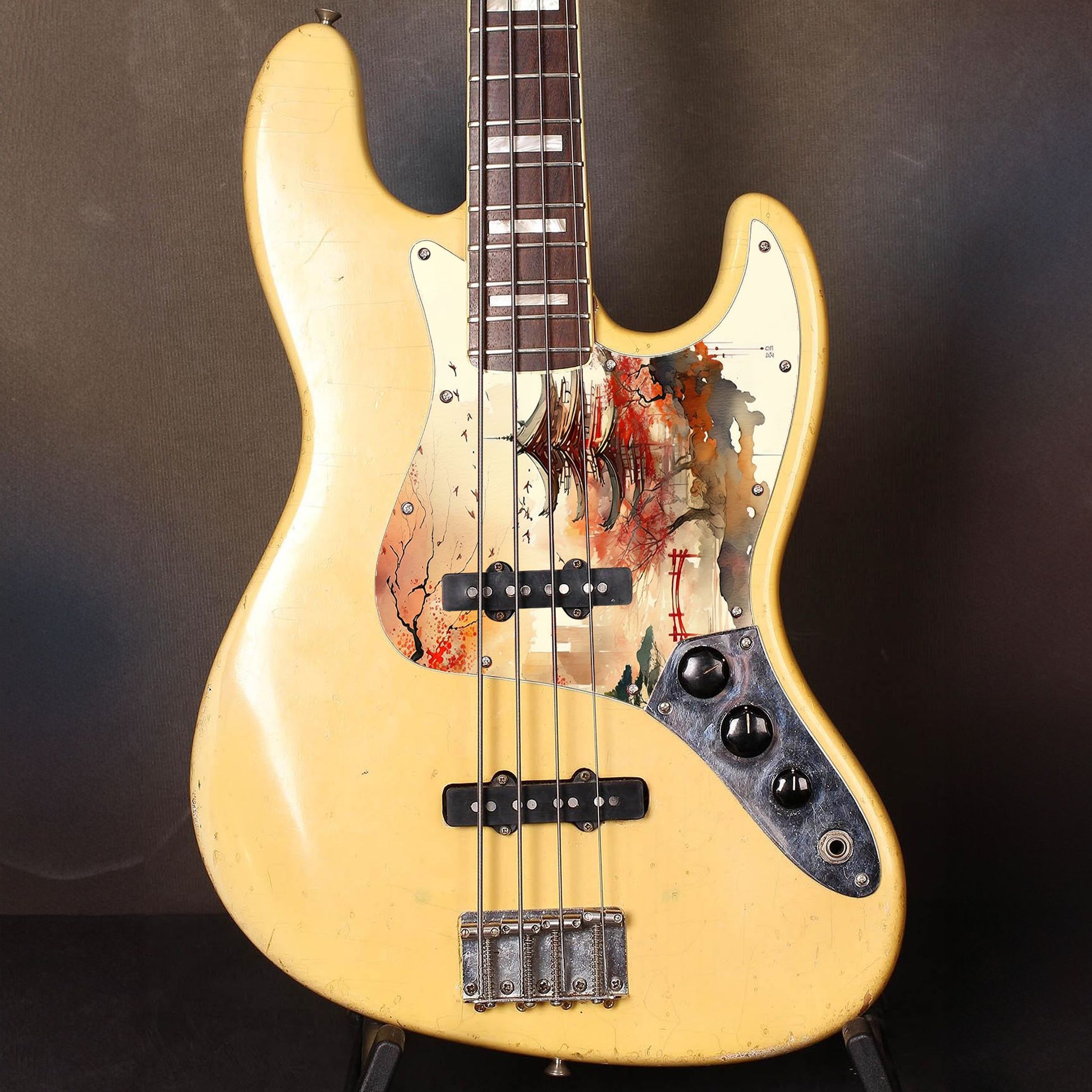 Egyedi Fender Jazz Bass gitár koptató vörös pagodával, őszi lombú fákkal és madárrajjal a narancsos égbolt alatt