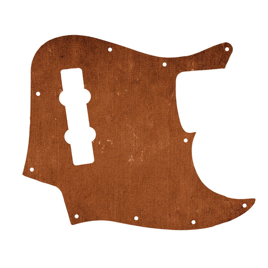 Egyedi Fender Jazz Bass gitár koptató meleg barna vászonhatású textúrával, enyhén kopott felülettel és vintage stílusú részletekkel