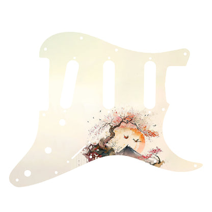 Egyedi Fender Stratocaster gitár koptató ívelt cseresznyefával, távoli hegycsúccsal és naplementében repülő madarakkal