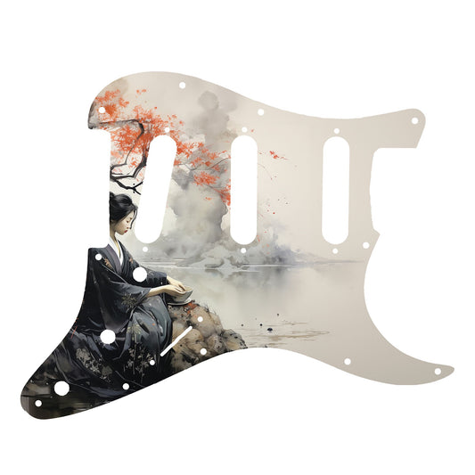 Egyedi Fender Stratocaster gitár koptató japán nőalak ábrázolásával, fekete kimonóban, vörös levelű fa alatt ülve a folyóparton