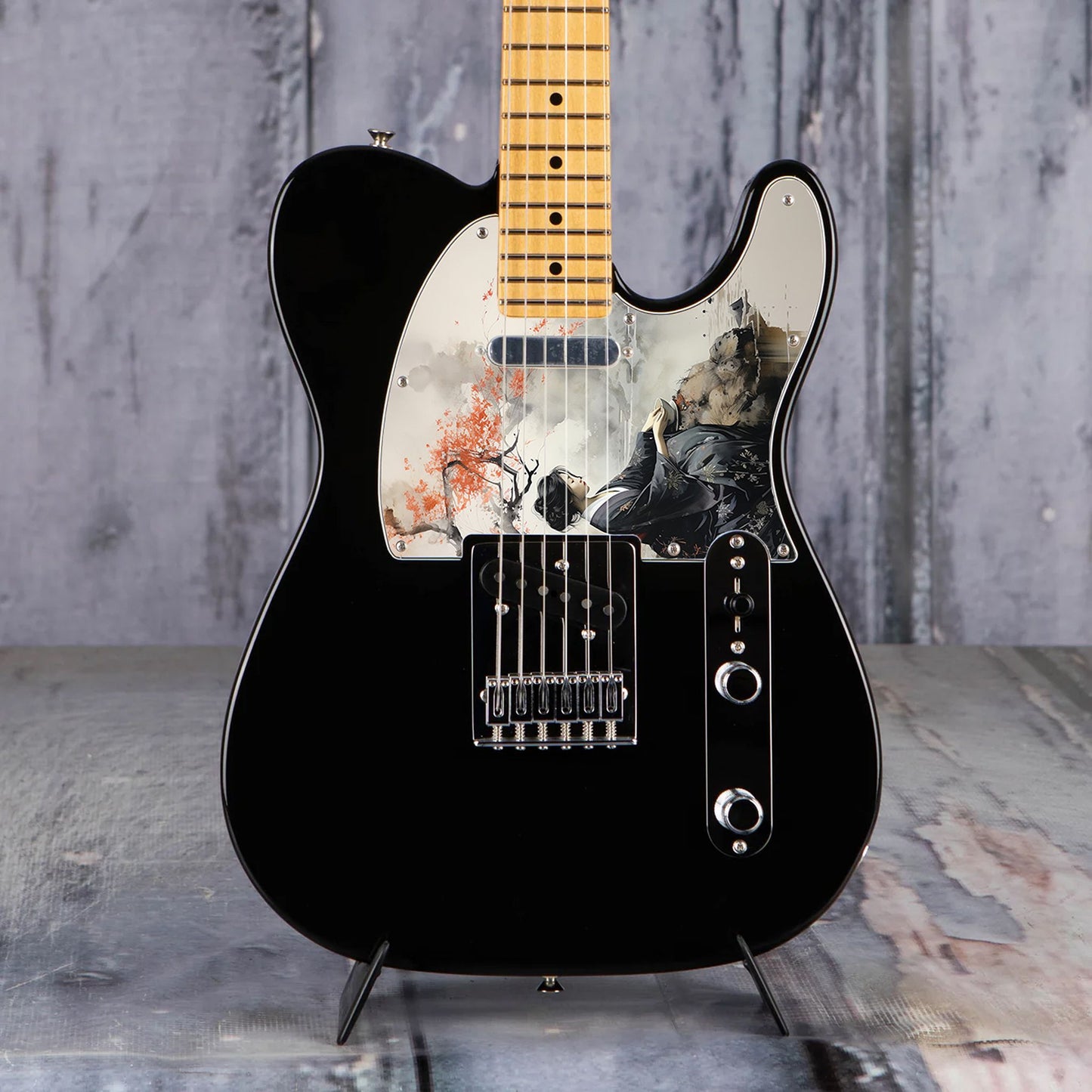 Egyedi Fender Telecaster gitár koptató japán nőalak ábrázolásával, fekete kimonóban, vörös levelű fa alatt ülve a folyóparton