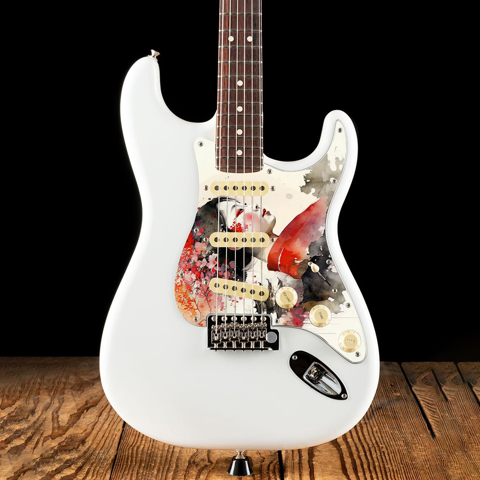 Egyedi Fender Stratocaster gitár koptató piros kimonót viselő japán nő portréjával, virágdíszítéssel és pagodával a háttérben