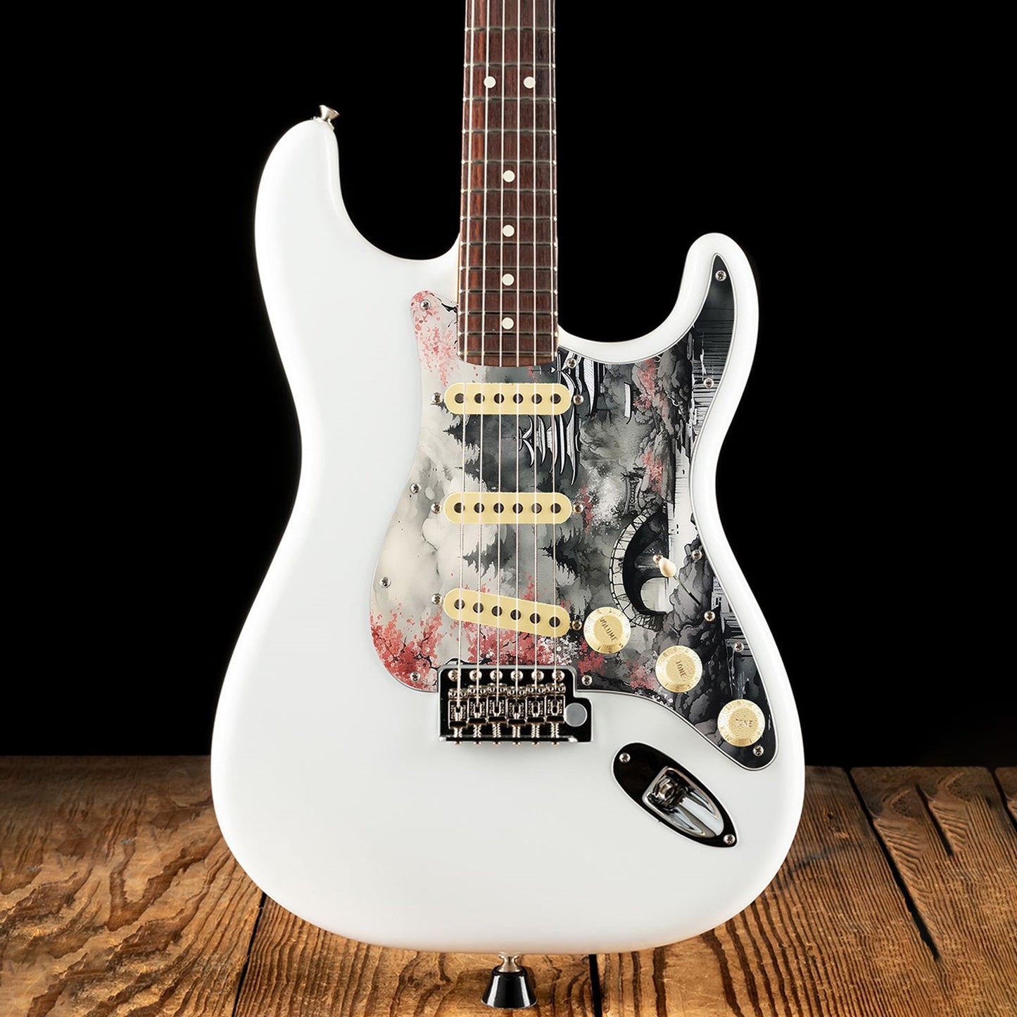 Egyedi Fender Stratocaster gitár koptató japán cseresznyefával, kőhíddal és hegyekkel a ködös tájban