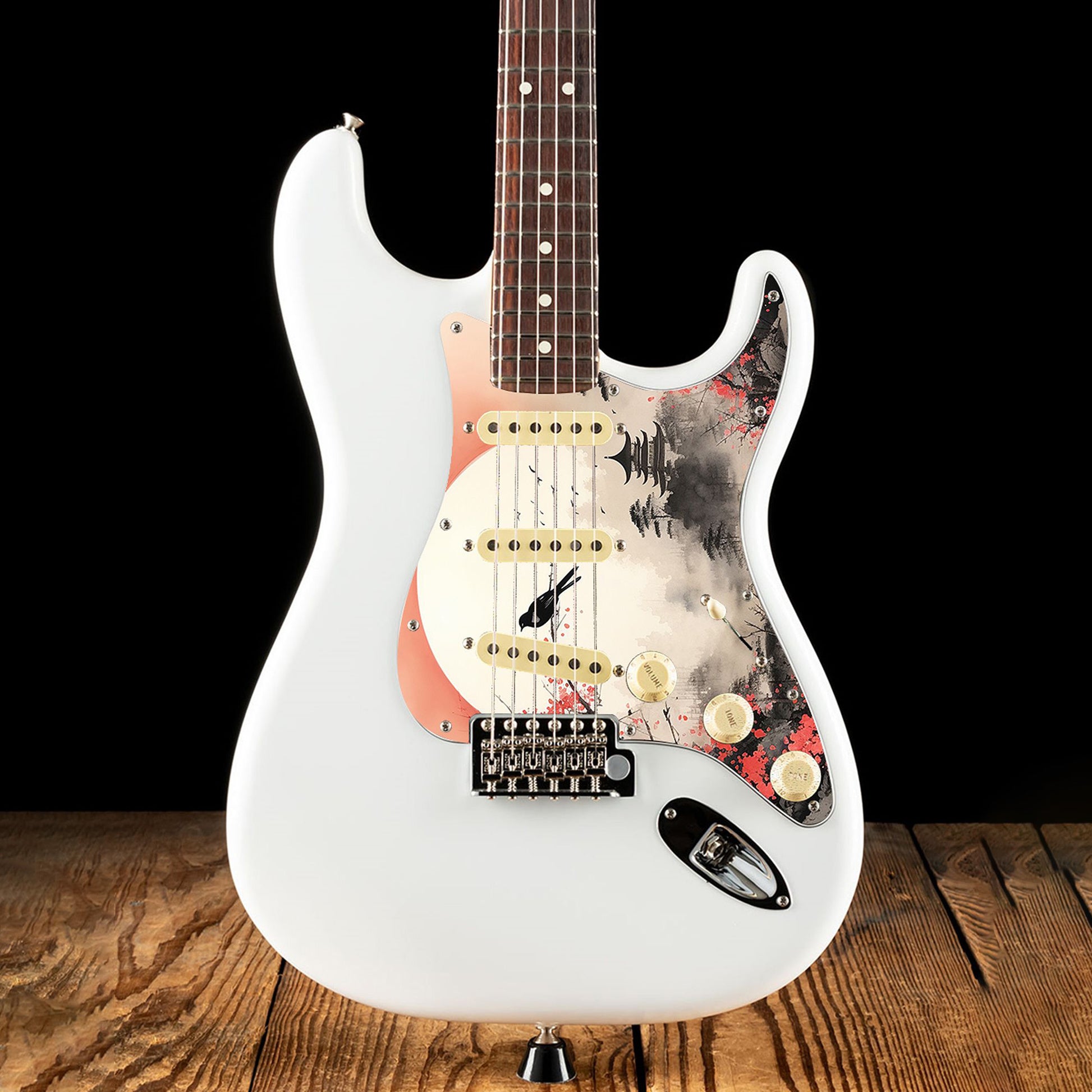 Egyedi Fender Stratocaster gitár koptató vörös virágzó fával, ágon ülő madárral és ködös folyóparti tájképpel a háttérben