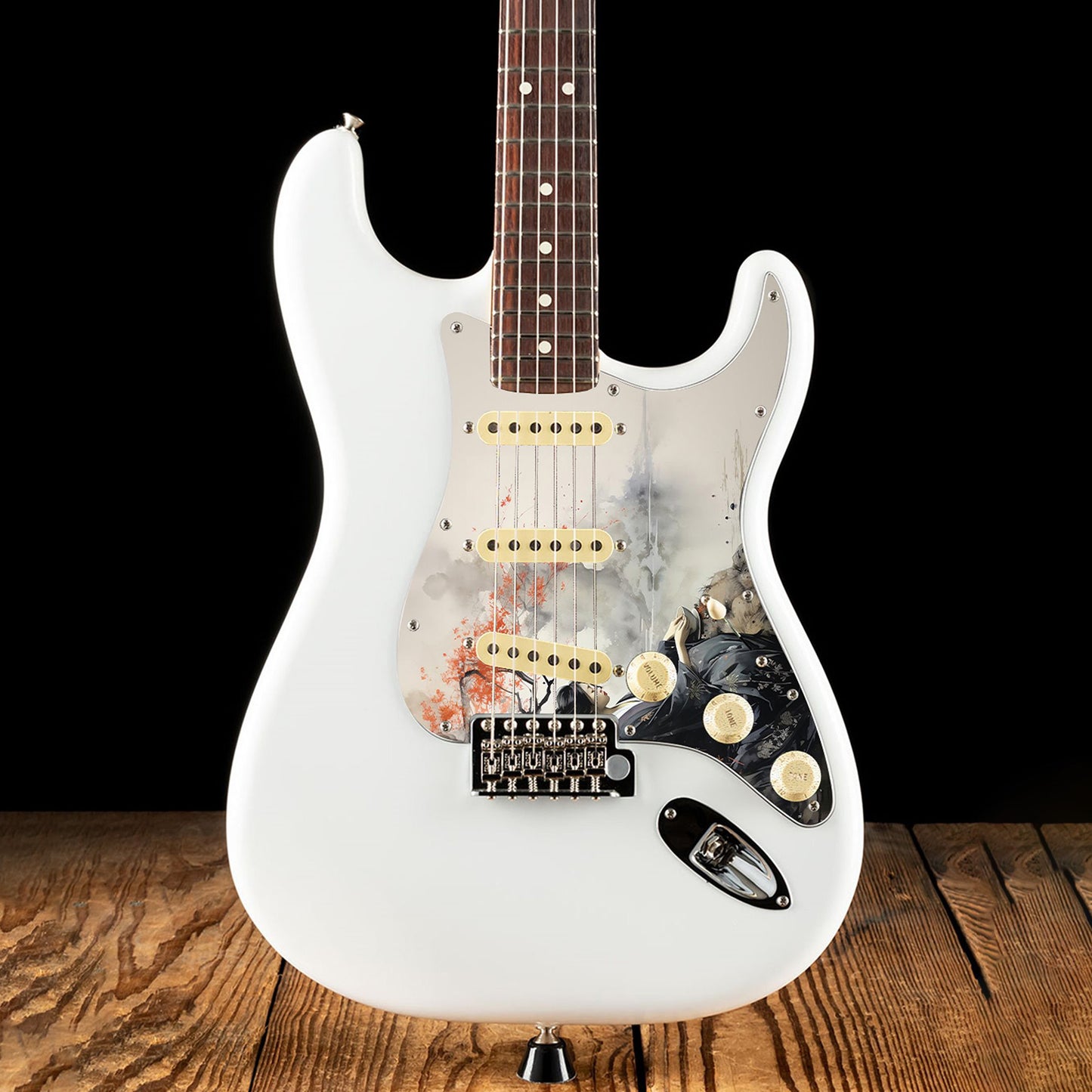 Egyedi Fender Stratocaster gitár koptató japán nőalak ábrázolásával, fekete kimonóban, vörös levelű fa alatt ülve a folyóparton