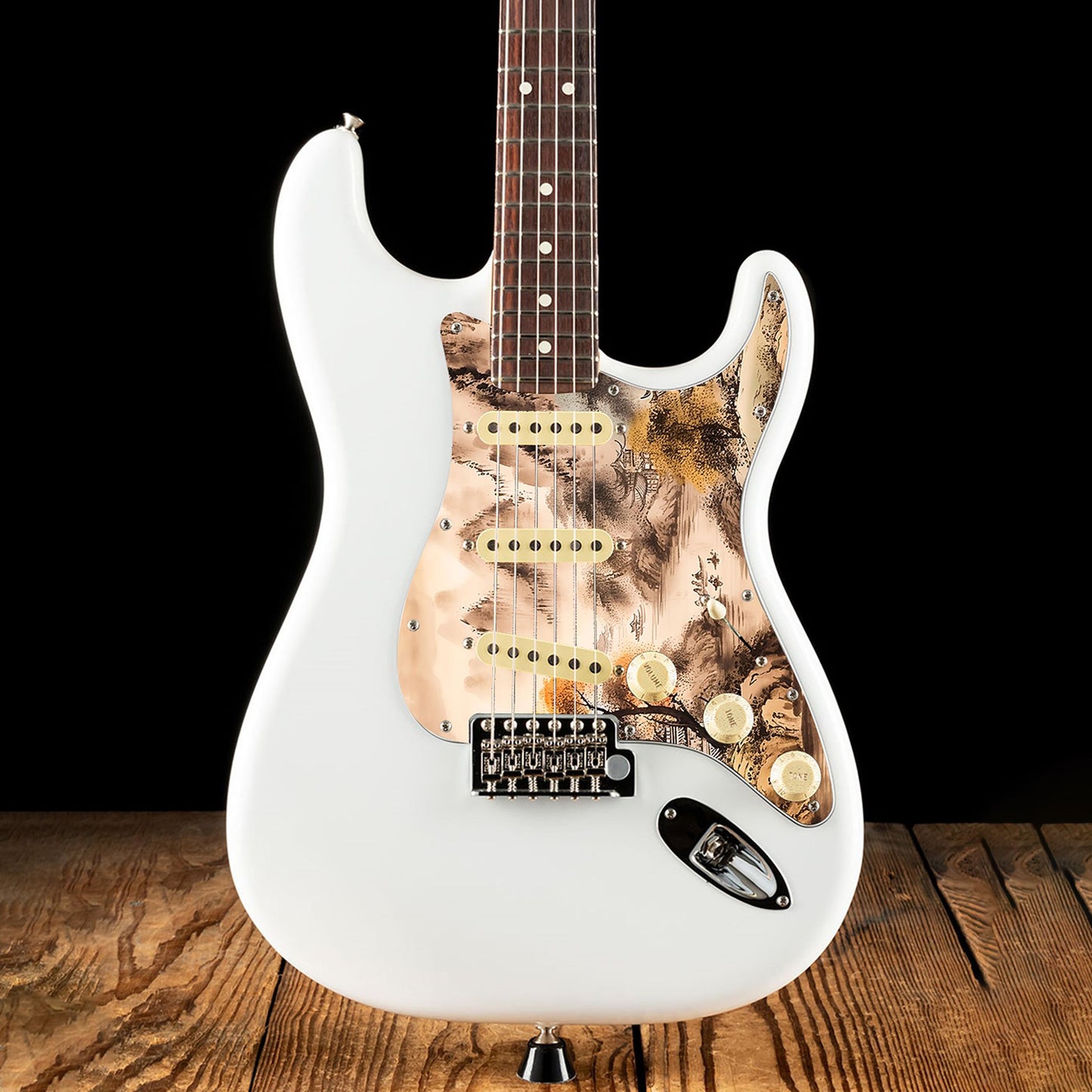 Egyedi Fender Stratocaster gitár koptató tradicionális tájképpel, narancssárga lombú fával, hegyekkel és folyón evező csónakokkal