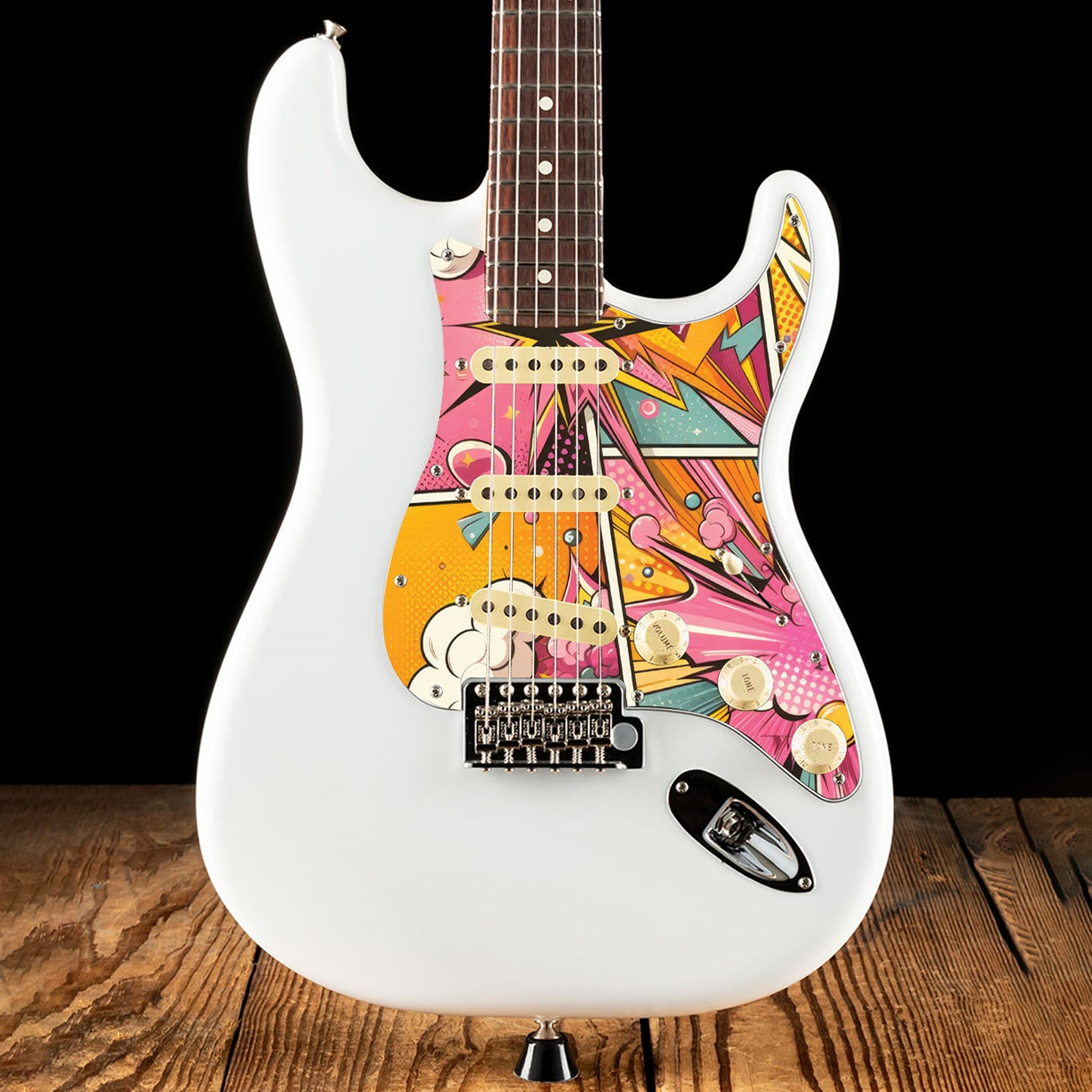 Egyedi Fender Stratocaster gitár koptató színes képregény stílusú grafikával, dinamikus vonalakkal és élénk színekkel