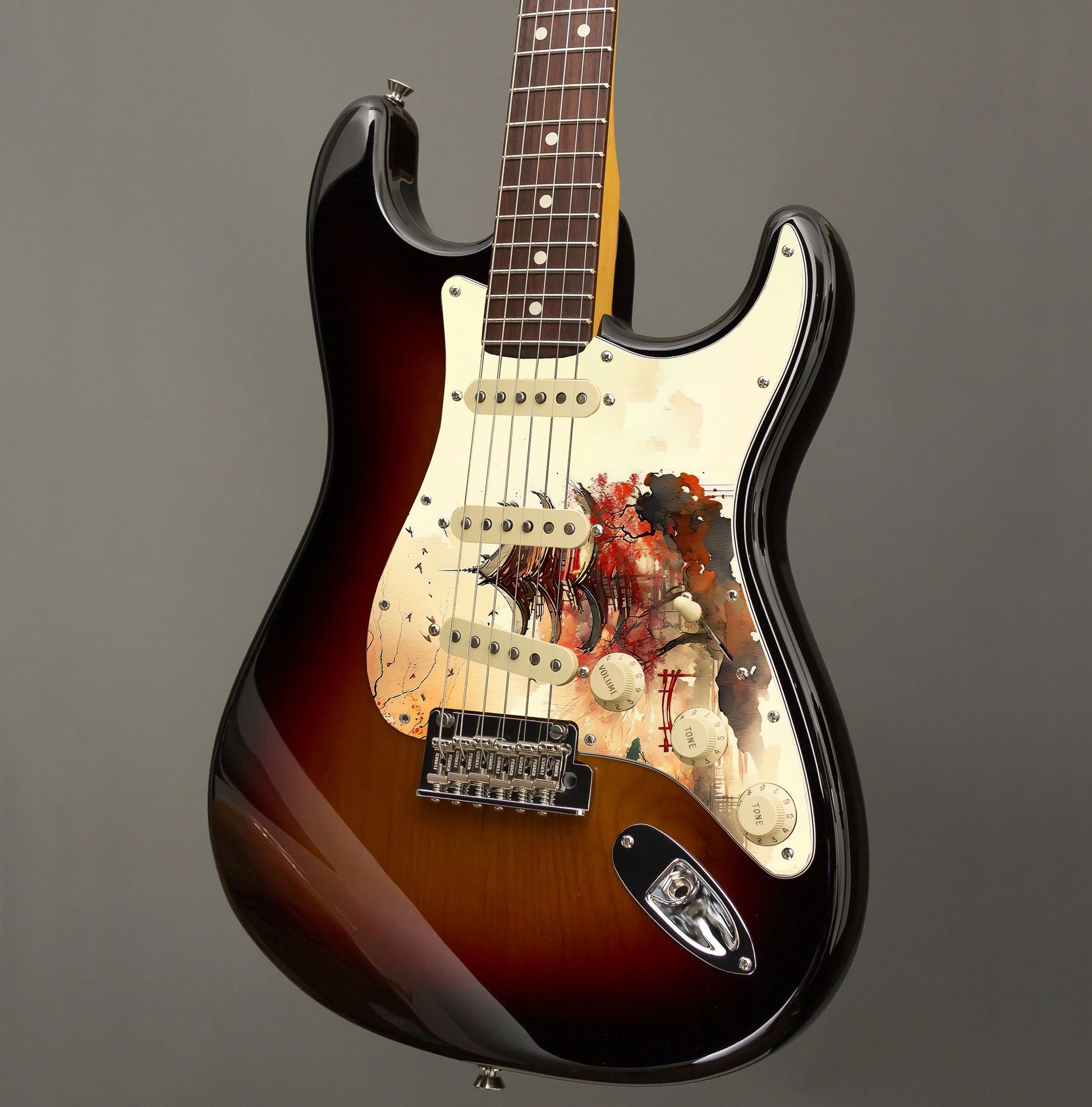 Egyedi Fender Stratocaster gitár koptató vörös pagodával, őszi lombú fákkal és madárrajjal a narancsos égbolt alatt