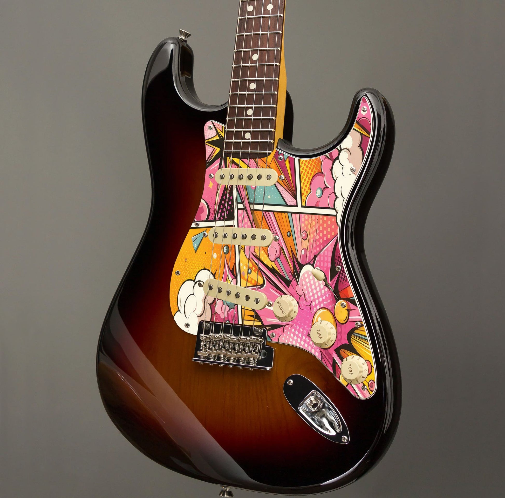 Egyedi Fender Stratocaster gitár koptató színes képregény stílusú grafikával, dinamikus vonalakkal és élénk színekkel