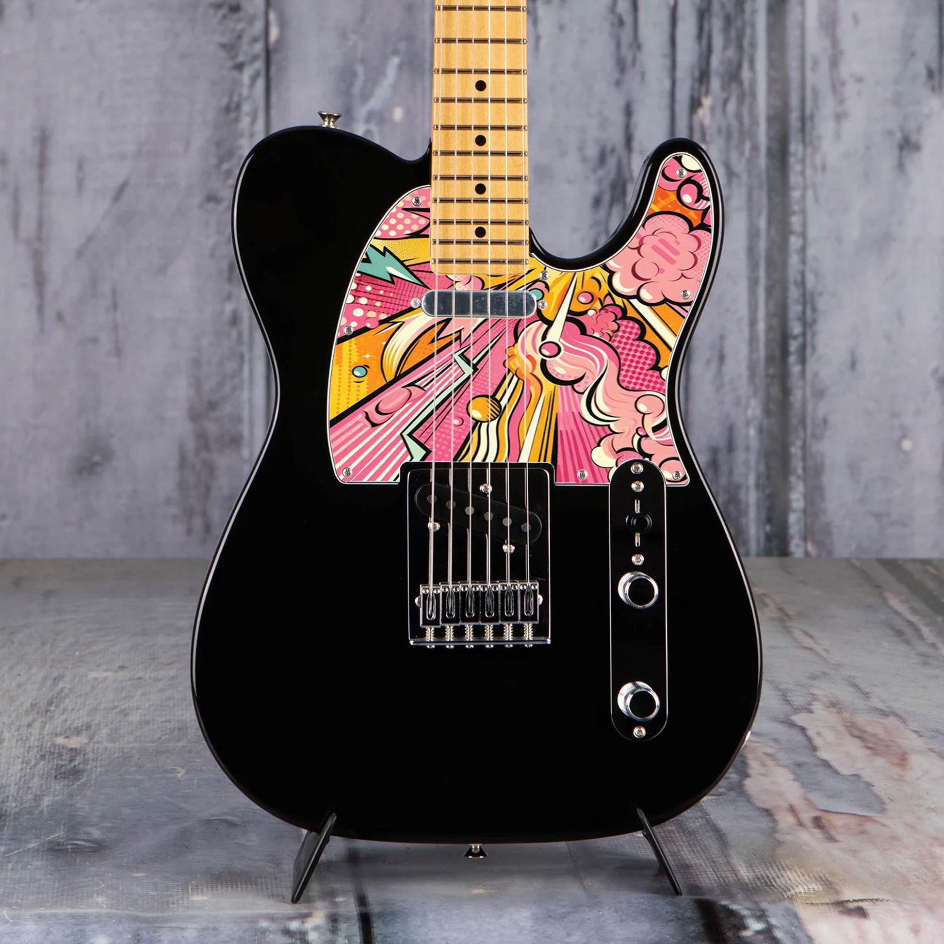 Egyedi Fender Telecaster gitár koptató élénk pop-art stílusban, sárga, rózsaszín és narancs árnyalatokkal, dinamikus mintázattal